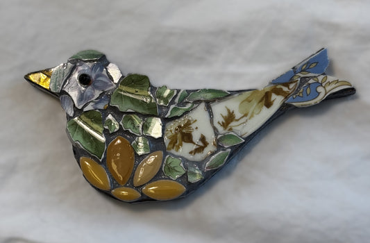 Dusty blue bird with ivy feathers