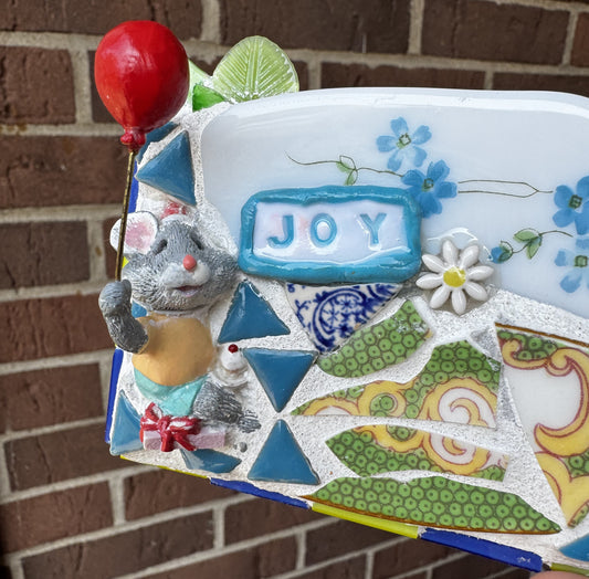 JOY mosaic with celebrating mouse, cupcake and red balloon
