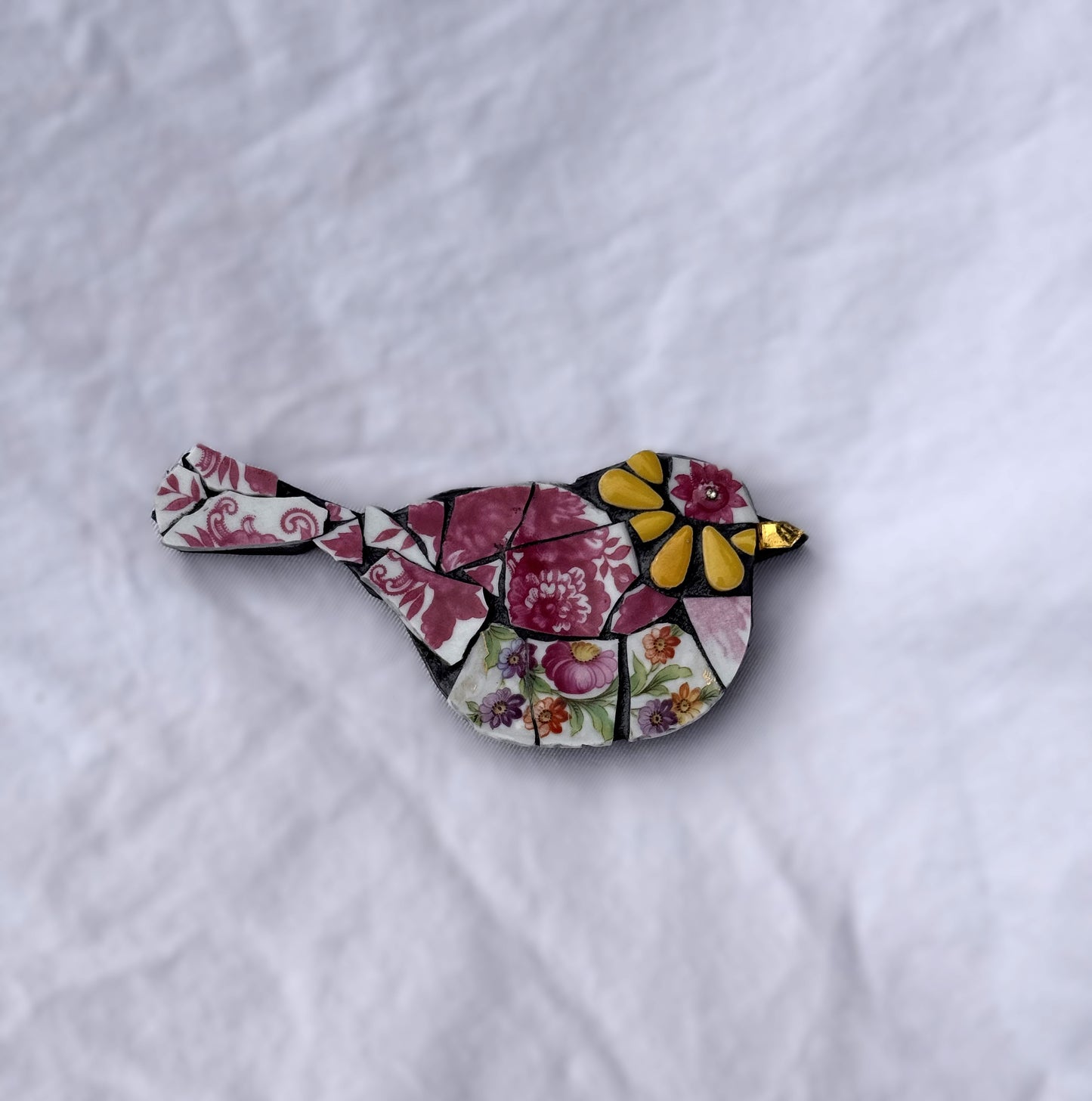 Vintage china and ceramic tiles bird